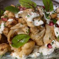 Grilled Cauliflower · Toasted pine nuts, pomegranate seeds.