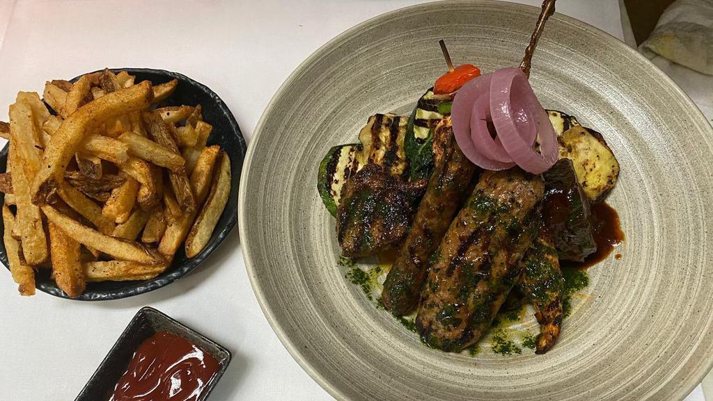 Pergola Mixed Grill For Two · Colorado lamb chops, barbecue beef rib chicken kebab, merguez, kofta kebab served with hand cut fries.