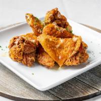 “Kylee’S Fav” Wings · Crispy wings folded in our signature sauce or simply fried GBD style!
