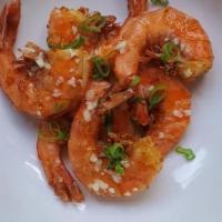 Garlicky Shrimp · Shell on flash-fried jumbo shrimp drizzled with garlic butter goodness.