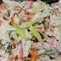 Crab Meat Salad · Salad made with crab or imitation crab typically tossed in seasoning and mayonnaise.