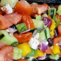 Greek Salad · Tomatoes, cucumber, onion and olives.