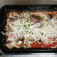 Eggplant Rollatini · Eggplant rolled and baked with cheese.