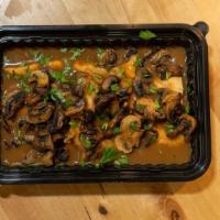 Chicken Marsala · Cooked in a wine sauce.