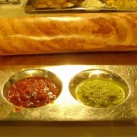 Plain Dosa · Vegan. Crepe is made of rice and lentil. Served with chutney and sambar.