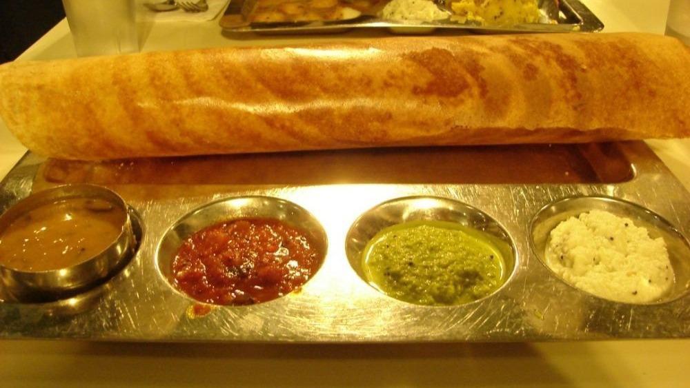 Plain Dosa · Vegan. Crepe is made of rice and lentil. Served with chutney and sambar.