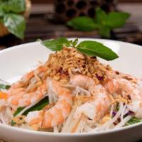 Papaya Salad With Grilled Shrimp · Gluten-free. purple cabbage, carrot, fried onion, mint leaf, and peanut.