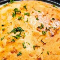 Chicken Pot Pie · organic chicken breast, vegetables, creamy herb gravy, scallion-cheddar biscuit crust