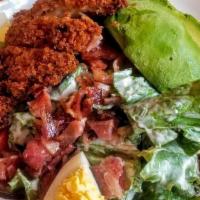 Crispy Chicken Cobb Salad · Crispy organic chicken breast, greens, bacon, crumbled blue cheese, radish, grape tomatoes, ...