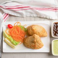 Veg Samosa · Spiced mashed potatoes stuffed in a delicate Indian pastry.