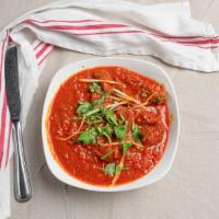 Lamb Vindaloo · Hot and spicy. Lamb marinated in spices and then cooked with potatoes and chilly paste.