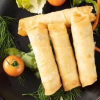 Cigarette Pie · Flaky pastry, filled with cheese and parsley.
