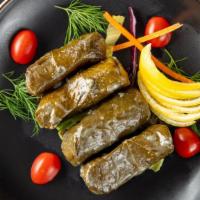 Grape Leaves · Grape leaves stuffed with rice, herbs, spices, parsley and onion.