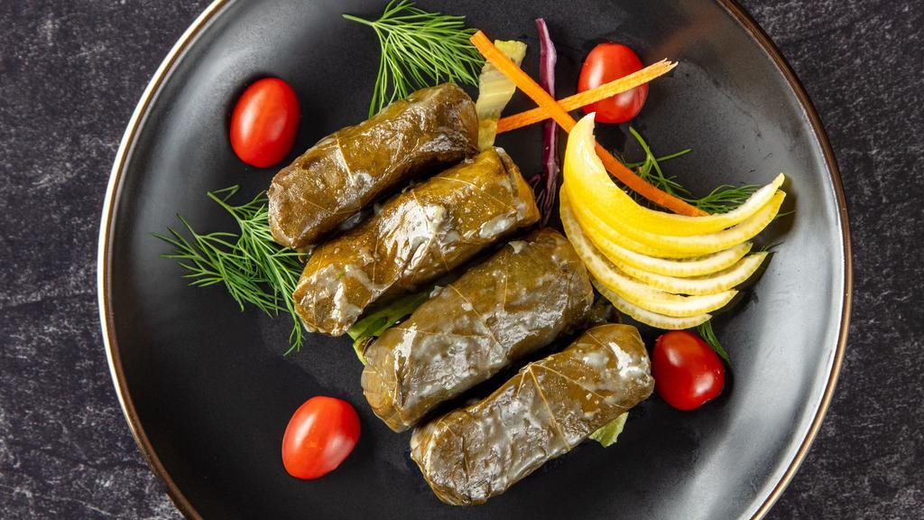 Grape Leaves · Grape leaves stuffed with rice, herbs, spices, parsley and onion.