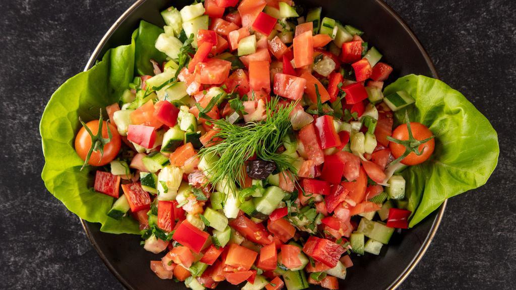 Shepherd Salad · Tomatoes, parsley, cucumbers, onions and scallions with vinegar and extra virgin olive oil dressing.