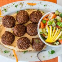 Falafel Platter · Ground chickpeas and parsley. Served with hummus and shepherd salad.