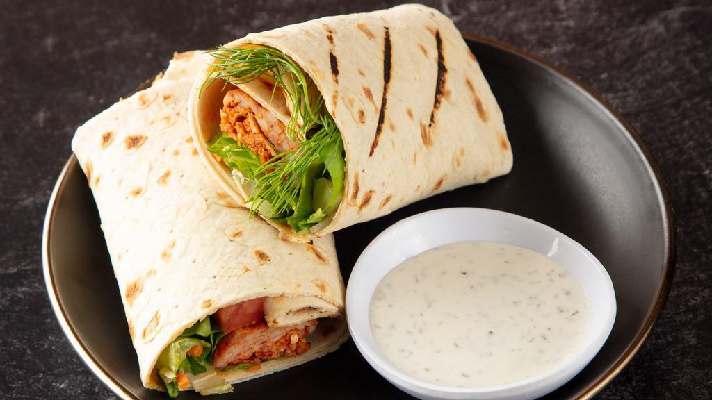 Adana Kebab Wrap · Served lettuce, and tomatoes, white sauce.
