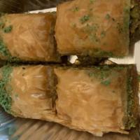 Baklava · Very thin layers of dough with pistachios and syrup.
