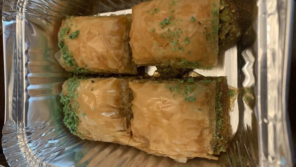 Baklava · Very thin layers of dough with pistachios and syrup.