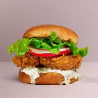Case Of The Classic Sandwich · Crispy fried chicken, lettuce, tomato, onion, and house mayo sauce. Served on a warm bun.