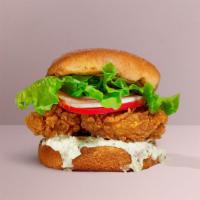Courtesy Of The Cajun Chicken Sandwich · Crispy fried chicken, pepperjack cheese, jalapenos, and cajun sauce. Served on a warm bun.