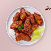 Honey Grill Bbq Wings · Fresh chicken wings breaded, fried until golden brown, and tossed in honey and barbecue sauc...