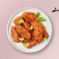 Hot Ville Wings · Fresh chicken wings breaded, fried until golden brown, and tossed in Nashville Hot Sauce. Se...