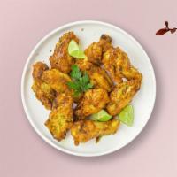 Pepper Zinger Wings · Fresh chicken wings breaded, fried until golden brown, and tossed in lemon pepper sauce. Ser...