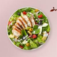 Bistro Salad · Grilled chicken breast, romaine lettuce, crumbled feta cheese, and walnuts topped with balsa...