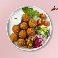 Falafel · (Four pieces) Baked and fried mixture of garbanzo beans, fava beans, coriander, cumin, parsl...