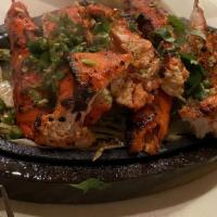 Tandoori Chicken Wings · Marinated chicken wings cooked in clay oven.
