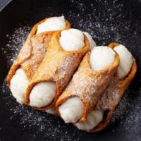 Cannoli · Classic Italian pastry filled with sweet ricotta cheese.