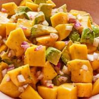 Avocado  And Mango Salad · Served on mixed greens with crushed peanuts