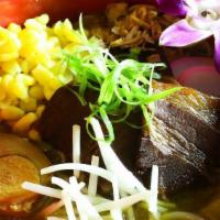 Curry Ramen · Served with chashu pork, kikurage, menma, corn, fish cake, egg, scallions, baby spinach, and...
