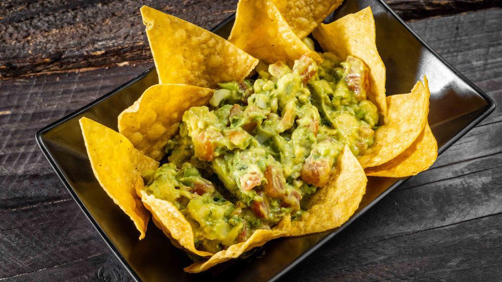 Guacamole Fresco / Fresh Guacamole · Our fresh guacamole serving with homemade Mexican chips.