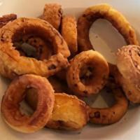 Onion Rings · Freshly cut onions lightly battered and fried until golden crisp. served with marinara sauce.