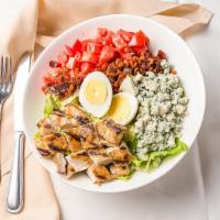Grilled Chicken Cobb Salad · Egg, tomato, bacon and gorgonzola, and blue cheese dressing.