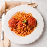 Fussilli Col Bucco With Meatballs · Long fusilli with filetto de pomodoro sauce.