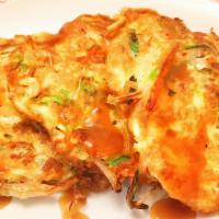 Roast Pork Egg Foo Young · It comes with white rice and gravy.