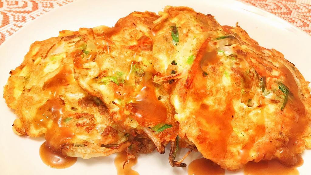 Roast Pork Egg Foo Young · It comes with white rice and gravy.