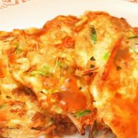 Vegetable Egg Foo Young · It comes with white rice and gravy.