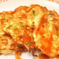 Beef Egg Foo Young · It comes with white rice and gravy.