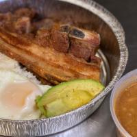 Bandeja Paisa / Typical Colombian Platter · Con arroz, frijoles, huevo, maduro, carne, chicharron, arepita y aguacate. / Served with ric...