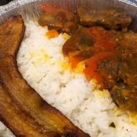 Lengua A La Criolla / Tongue Cooked In A Homemade Sauce · Con arroz, frijoles, ensalada y maduro. / Served with rice, beans salad and sweet plantain