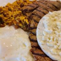 Calentado Mi Casa / House Special Calentado- · Calentado, carne asada, huevos al gusto, arepa con queso y aguacate. / Calentado, grilled be...