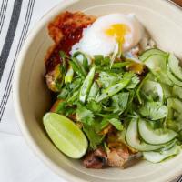 Penang · Grilled chicken, poached egg, cilantro, sambal (spicy), scallions, lime, cucumber salad, and...
