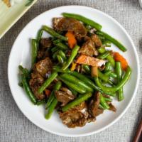 Beef Szechuan Style · Szechuan peppercorns, red chili oil and fresh chili paste sautéed with juicy tender beef and...