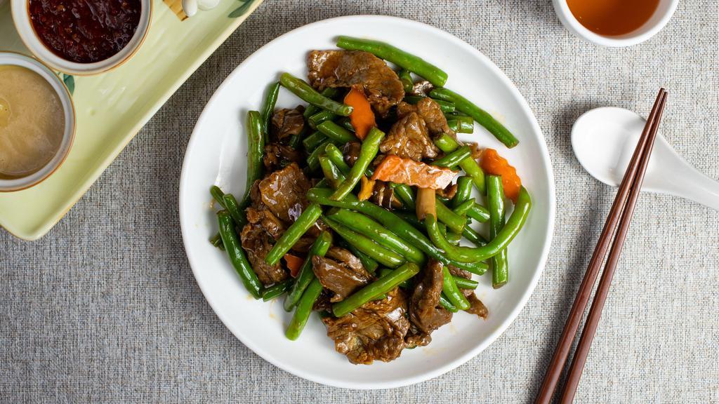 Beef Szechuan Style · Szechuan peppercorns, red chili oil and fresh chili paste sautéed with juicy tender beef and veggies. Served with rice.