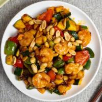 Szechuan Seafood · Jumbo shrimp, scallops, and imitation crab meat sautéed with mixed vegetables with spicy bro...