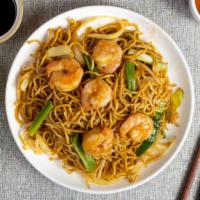 Shrimp Noodles · Thin vermicelli rice noodles, fresh shrimp, and seasonal vegetables cooked with house sauce.